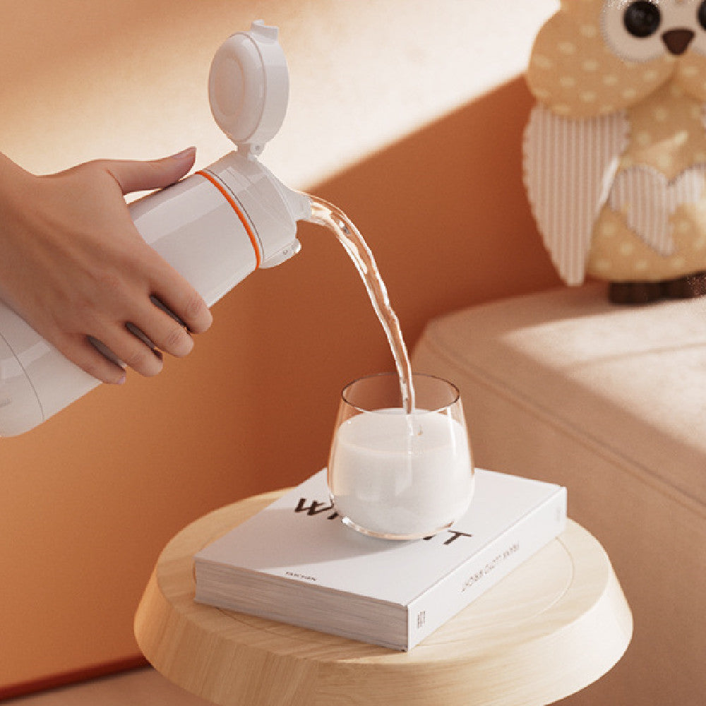 Chauffe-biberon portable